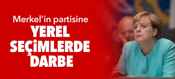 Merkel'in partisine yerel seçimlerde darbe