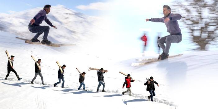 Şemdinlili gençler karlı tepeleri kayak pistine çevirdi