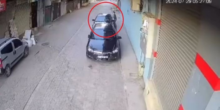 Hırsızlık yapacağı otomobilin camını kıran kişi, alarm çalınca kaçtı