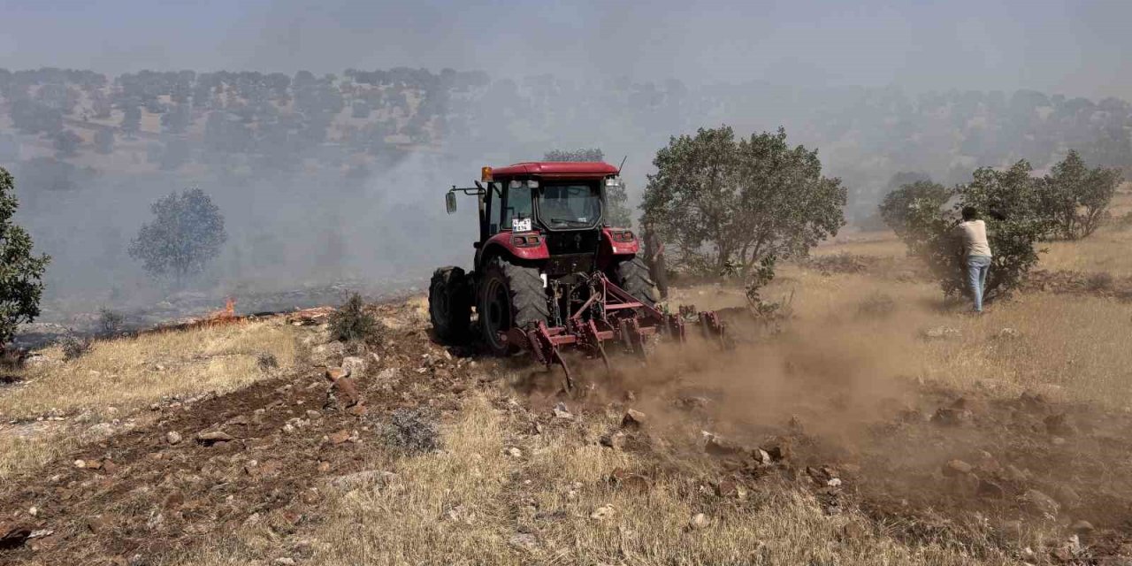 Ağaçlık alanda çıkan yangında çiftçilerin mücadelesi takdir edildi