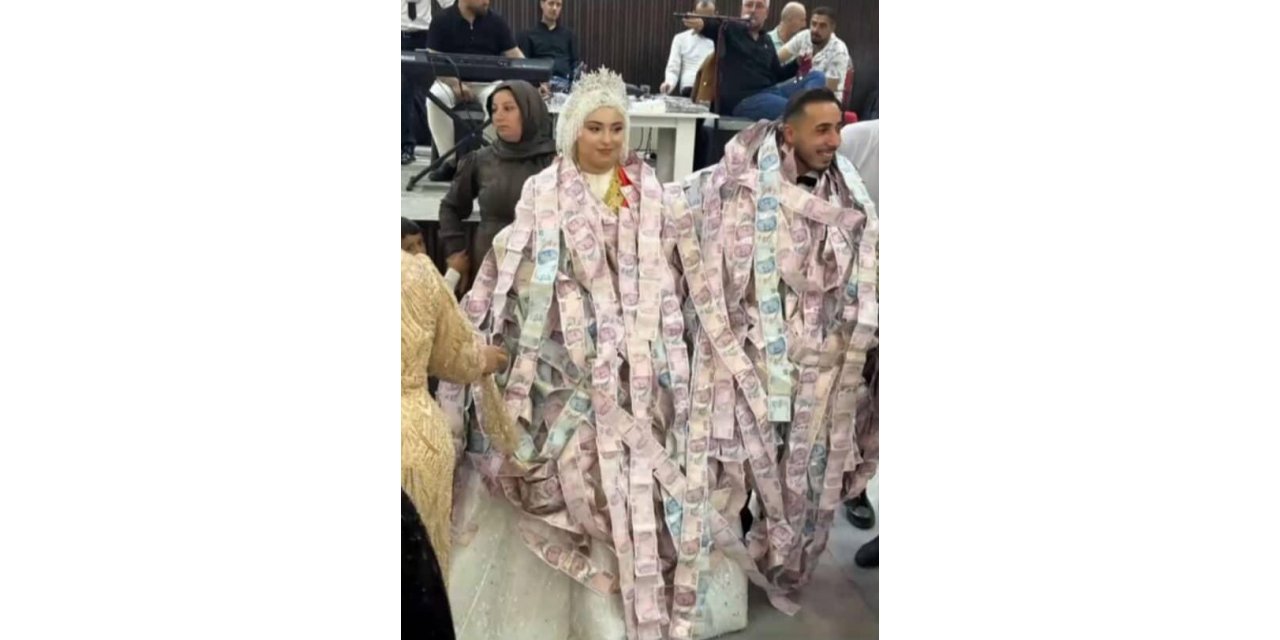 Damada 200 liralık banknotlardan oluşan yelek giydirildi
