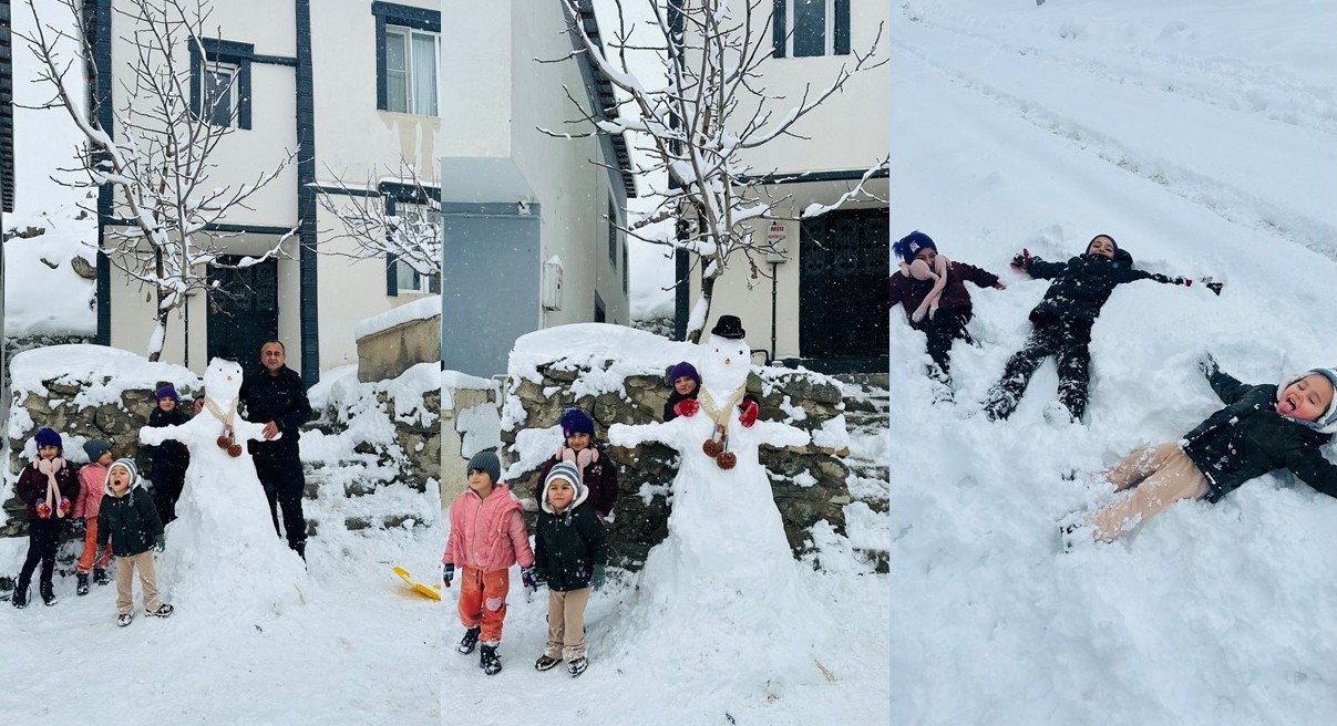 Hakkarili çocukların kardan adam sevinci